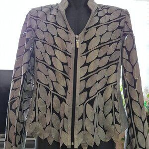 Unique leather on sheer woman jacket.